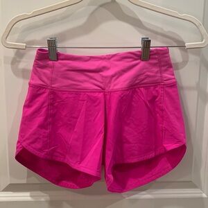 Pink Lululemon 4” shorts, size 4